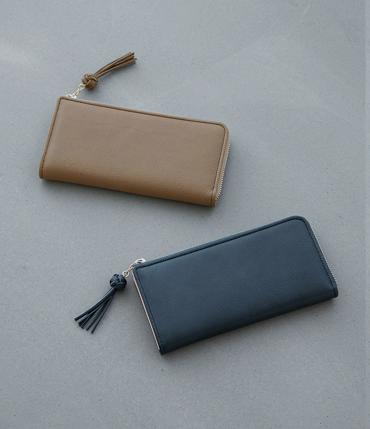 シックなデザインに、しっとり贅沢な革使い。充実の機能もうれしい長財布。